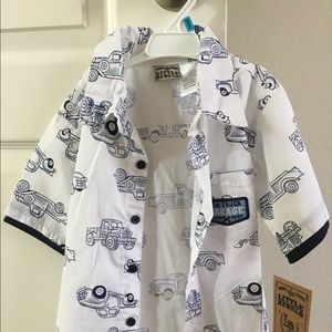 Button up shirt with old-fashioned pick up trucks